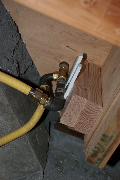 DSC_9172.jpg - This is the gas shut-off valve that code requires to be accessible from the family room.