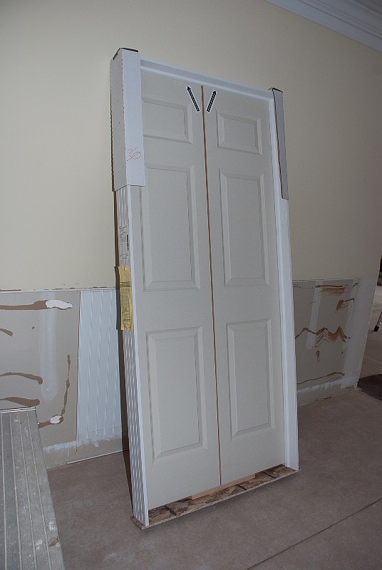 DSC_1002.jpg - The prehung double doors for the new closet have arrived.
