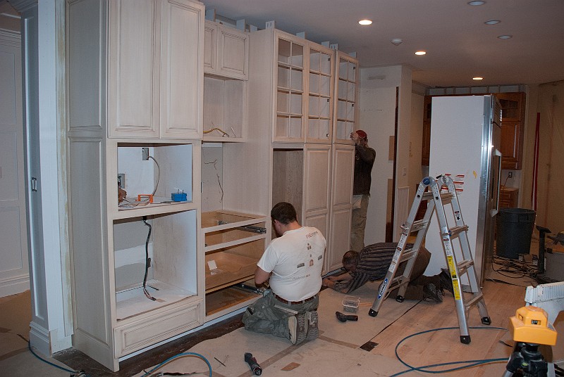 DSC_1272.jpg - The cabinets get mounted on the refrigerator wall.