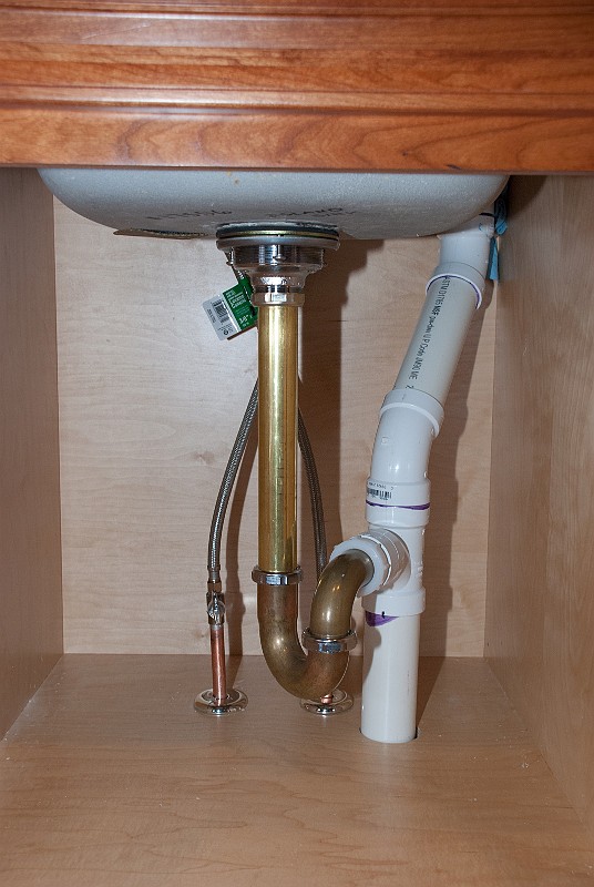 DSC_1438.jpg - I also finished the island sink plumbing, which required a 2-inch air admittance valve (shown on the right).