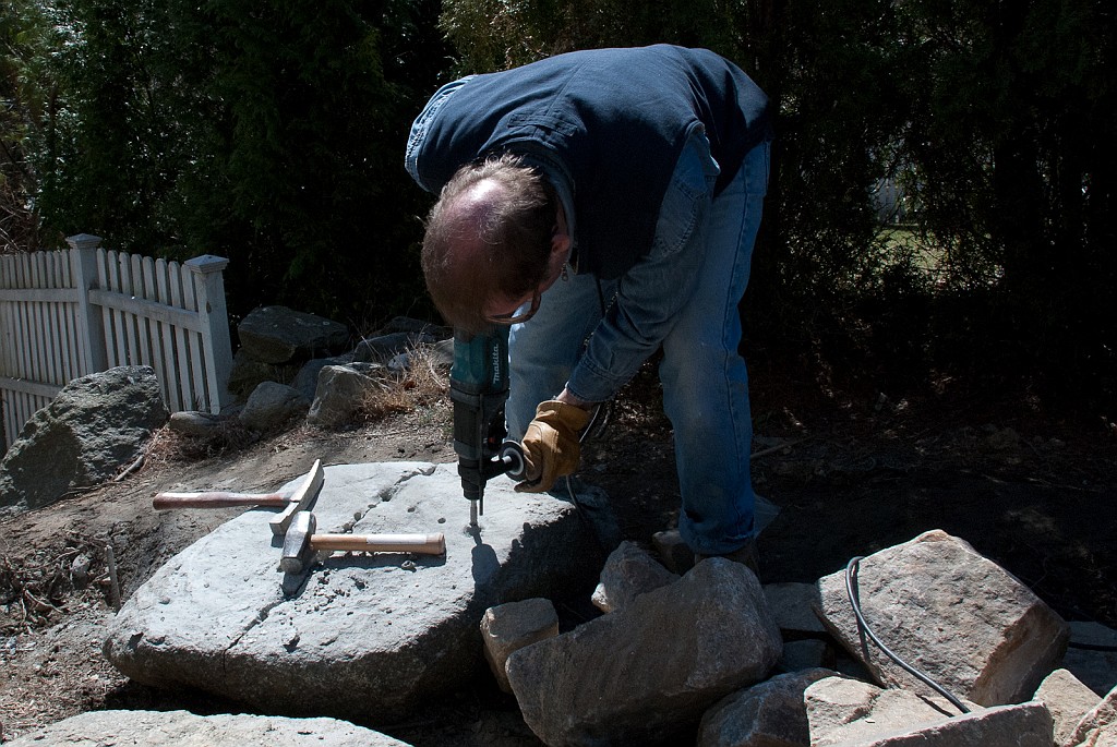 DSC_8502.jpg - I use my rotary hammer to drill holes in the stone for the wedges.