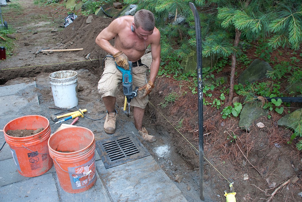 DSC_8660.jpg - We're digging the trench for the patio gas pipe.  Everything is going smoothly until...