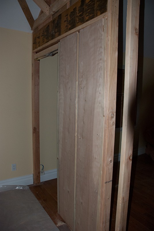 DSC_9475.jpg - The pocket door frames are stiffened up with plywood.