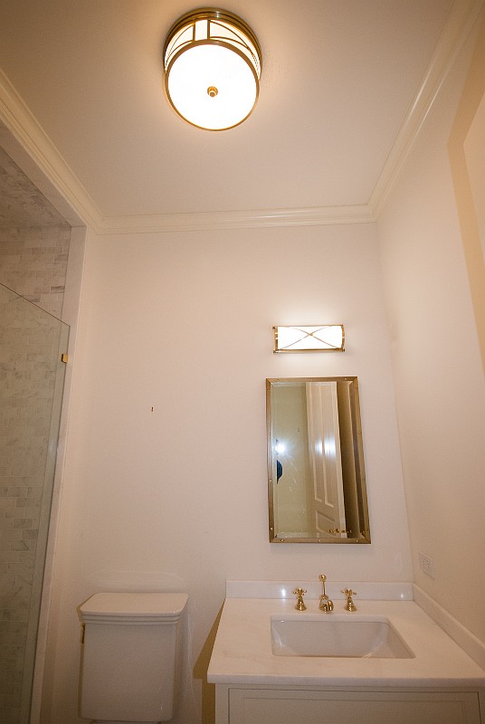 DSC_2372.jpg - Jayne bought, and I installed, the goldish-brass LED sconce and the ceiling fixture in the guest bathroom.