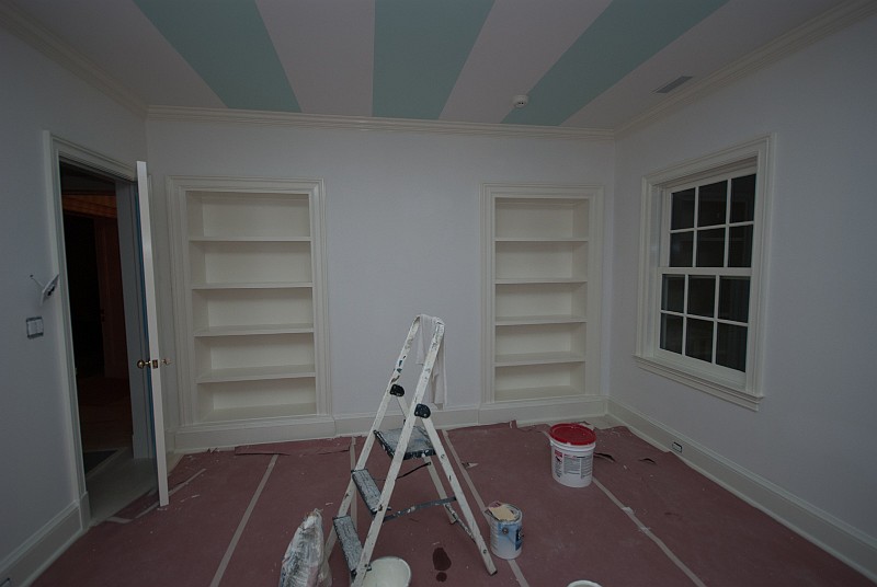 DSC_2730.jpg - The upstairs front bedroom receives paint on the recessed bookcases and trim.  The striped ceiling will get painted soon.