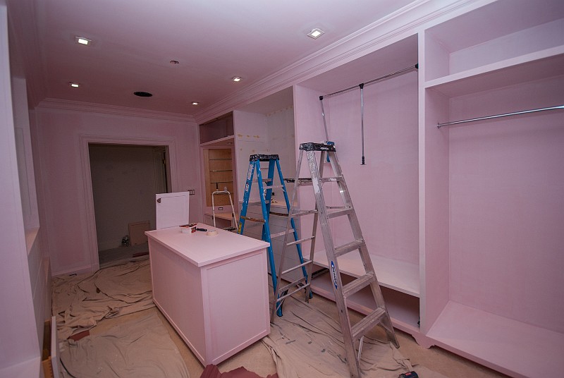 DSC_2790.jpg - Jayne's "Barbie's Pink Dream Closet" will soon be looking a lot less pink.  Here, after sanding and priming coats begin, the closet is looking a little different.